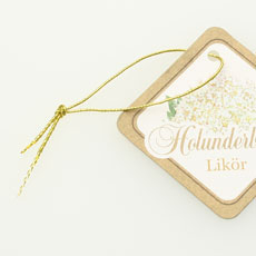 kartonetiketten hangtags mit goldenem gummifaden klein